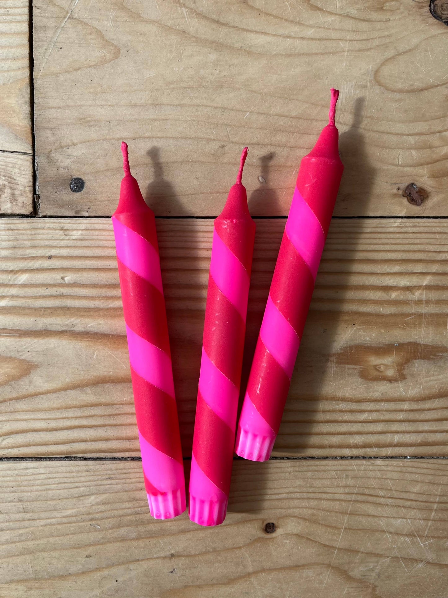 Neon pink & red Helter Skelter Candle