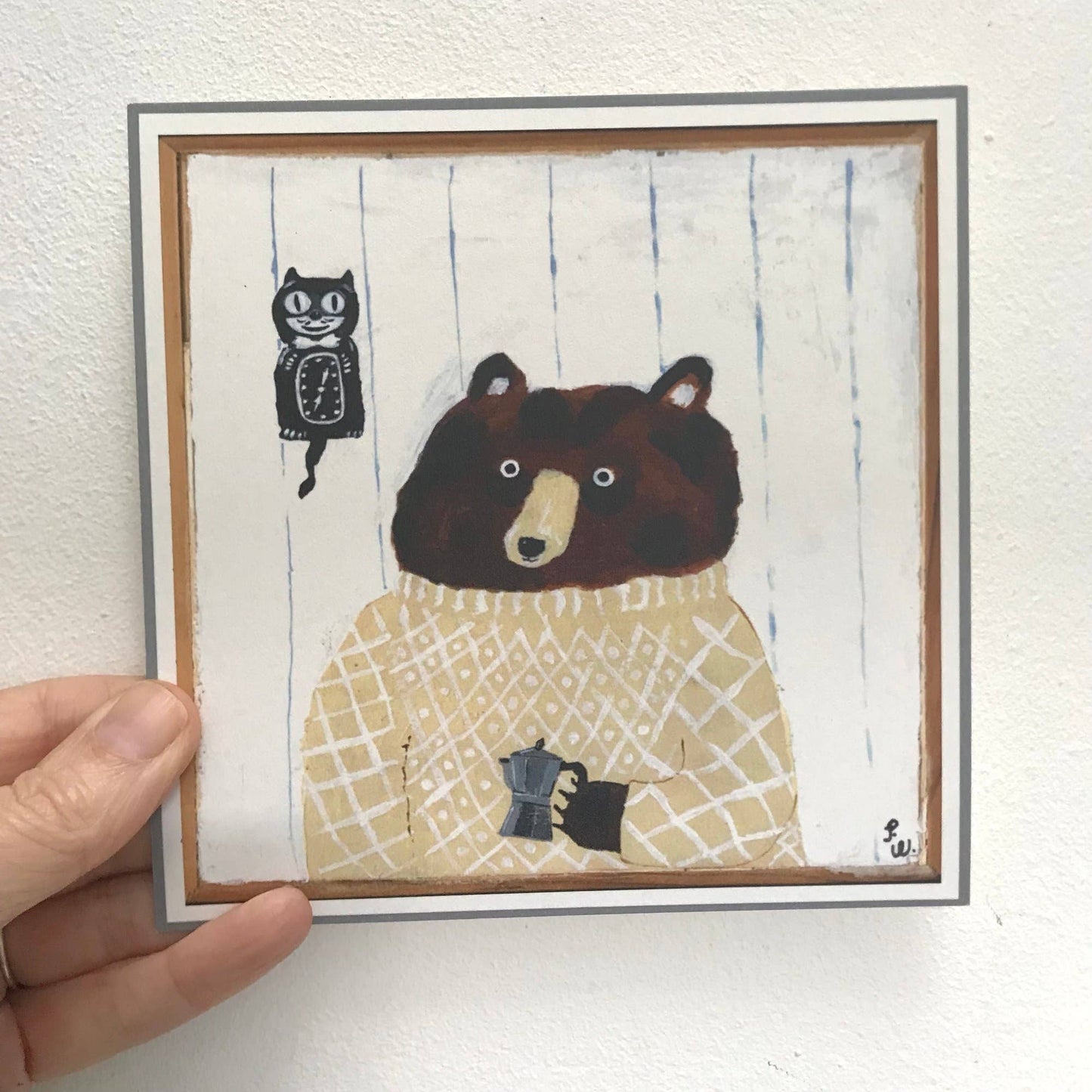 Small square print featuring a bear with coffee