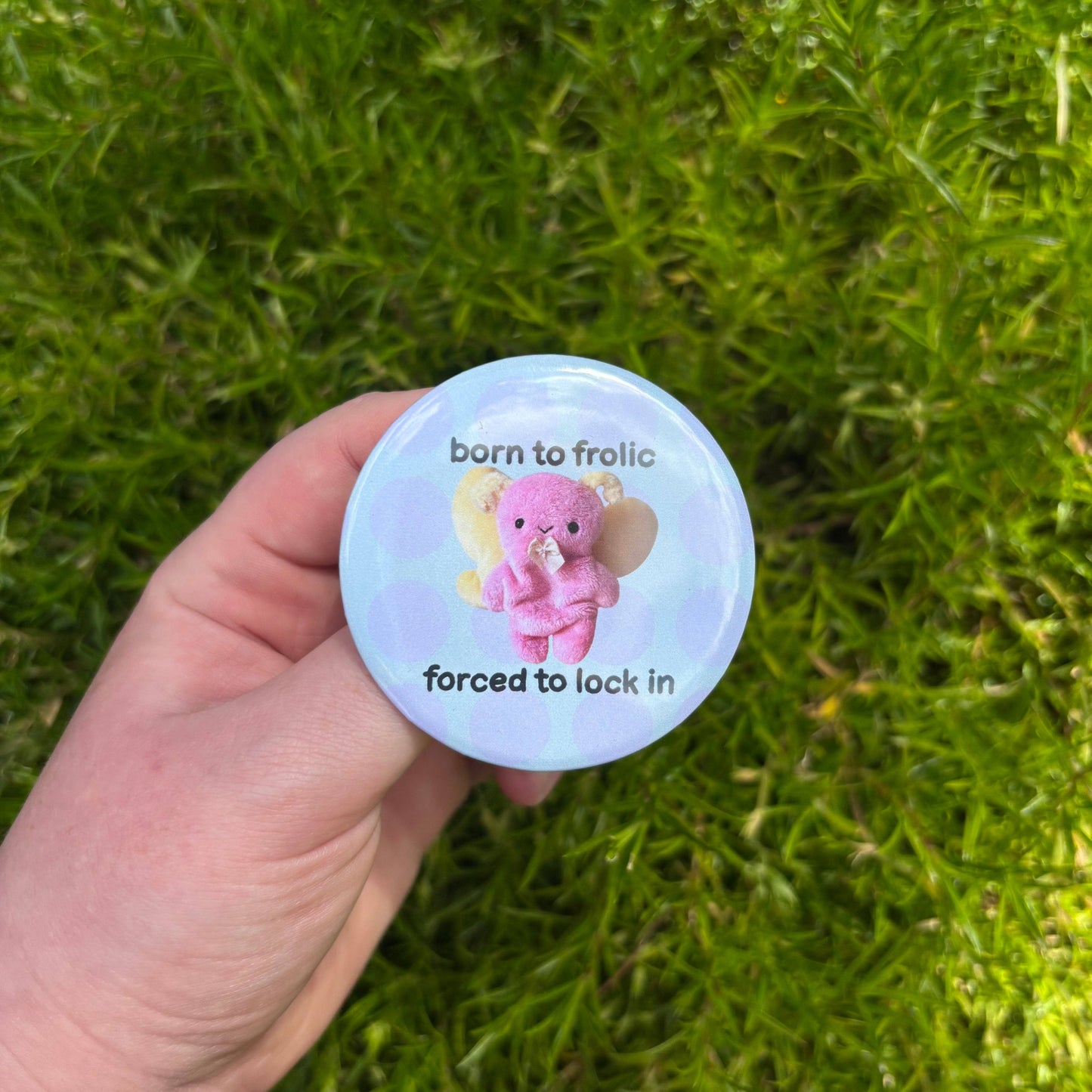'Born to frolic' button badge
